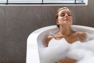 woman-enjoying-relaxing-bubble-bath